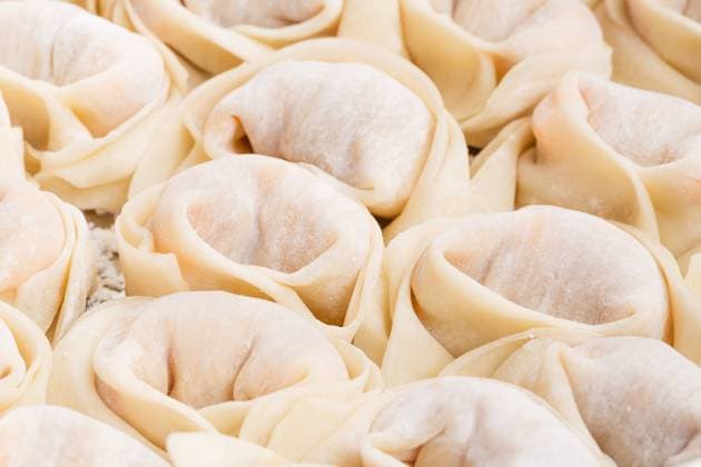 RECORD DATE NOT STATED Homemade dumpling close up , 9154500.jpg, homemade dumpling, handmade dumpling, sculpt dumpling, fresh, chinese dumpling, festival, chinese jiaoz, meat, pumpkin, wrapped, vegetable, shuijiao, chinese shuijiao, homemade, dumpling, handmade, sculpt, chinese, jiaoz, chinese new year, new year, food, raw,