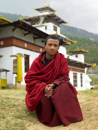 RECORD DATE NOT STATED A young Bhutanese monk at Thimpu Dzong in the Kingdom of Bhutan. , 9555802.jpg, kingdom, Bhutan, Bhutaese, travel, tourism, Himalayas, Asia, Thimpu dzong, monastery, man, male, religion, religious, Buddhism, Buddhist, robes, monk, monastic,