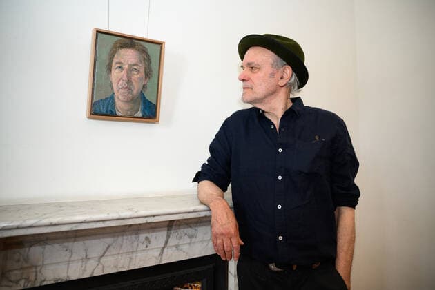 DOUG MORAN PORTRAIT PRIZE WINNER, Graeme Drendel poses for a photograph with his winning painting, Portrait of Lewis Miller, during the announcement of the winner of the 2022 Doug Moran National Portrait Prize at Juniper Hall in Sydney, Wednesday, November 30, 2022. ( NO ARCHIVING, EDITORIAL USE ONLY, NO USE IN BOOKS WITHOUT CONSENT SYDNEY NSW AUSTRALIA  Copyright: xDANxHIMBRECHTSx 20221130001736824815