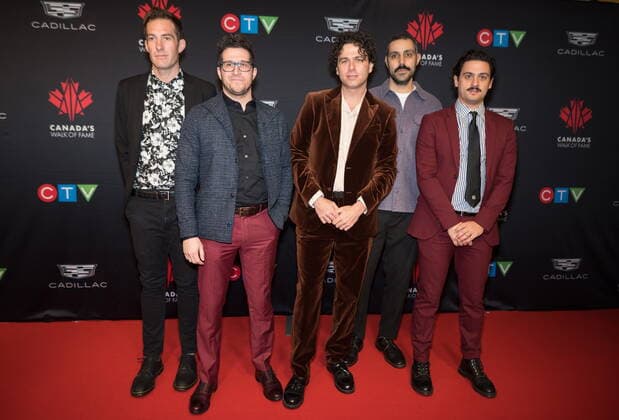 December 3, 2022, TORONTO, ON, CANADA: Arkells band members and 2022 inductees, pose for a photograph on the red carpet for the 2022 Canada™s Walk of Fame Gala in Toronto, on Saturday, December 3, 2022. TORONTO CANADA  - ZUMAc35_ 20221203_zaf_c35_123 Copyright: xTijanaxMartinx