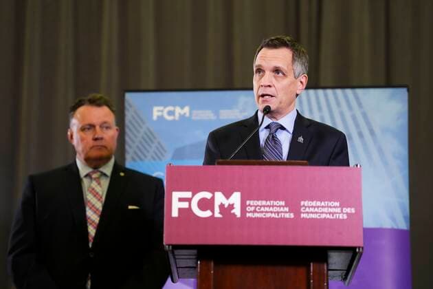 December 5, 2022, Ottawa, ON, Canada: Federation of Canadian Municipalities Big City Mayors Caucus Chair and Halifax Mayor Mike Savage, looks on as Ottawa Mayor Mark Sutcliffe speaks during a news conference in Ottawa on Monday, Dec. 5, 2022. Ottawa Canada  - ZUMAc35_ 20221205_zaf_c35_034 Copyright: xSeanxKilpatrickx