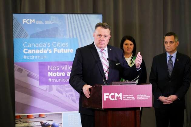 December 5, 2022, Ottawa, ON, Canada: Federation of Canadian Municipalities Big City Mayors Caucus Chair and Halifax Mayor Mike Savage, Gatineau Mayor France Belisle and Ottawa Mayor Mark Sutcliffe hold a news conference in Ottawa on Monday, Dec. 5, 2022. Ottawa Canada  - ZUMAc35_ 20221205_zaf_c35_038 Copyright: xSeanxKilpatrickx