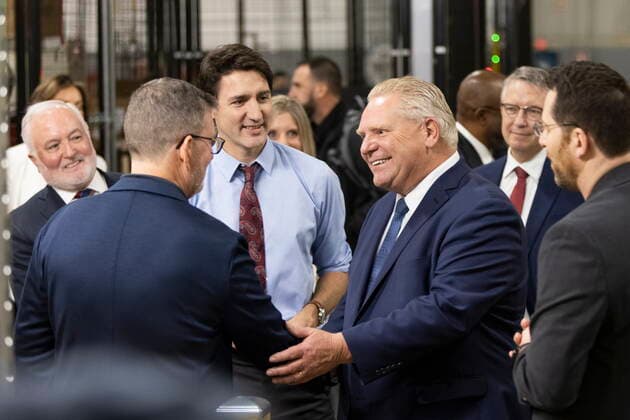 December 5, 2022, Ingersoll, Ontario, Canada: Prime Minister Justin Trudeau and Premier Doug Ford tour the General Motors CAMI assembly plant in Ingersoll, Ont., on Monday, December 5, 2022. Trudeau and Ford marked a Canadian milestone Monday, celebrating the launch of the country s first full-scale electric vehicle manufacturing plant. Ingersoll Canada  - ZUMAc35_ 20221205_zaf_c35_044 Copyright: xNicolexOsbornex