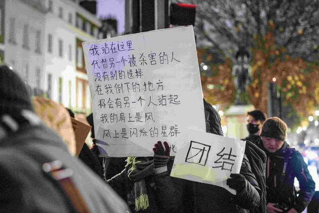 December 5, 2022, London, United Kingdom: Protesters hold placards during the demonstration outside the Chinese Embassy in London. Chinese students who are currently studying in London gathered at the Chinese Embassy in London to protest against the lockdown policy in China. A massive wave of protests outbroke in China last week since 10 people were killed in a Urumqi in the Northwest region of China due to the inhumane COVID lockdown policy. London United Kingdom - ZUMAs197 20221205_zaa_s197_047 Copyright: xHestherxNgx