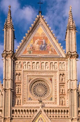 View of the upper part of the artful gothic facade of Orvieto Cathedral Orvieto Umbria Italy Reise FB_2019_1816
