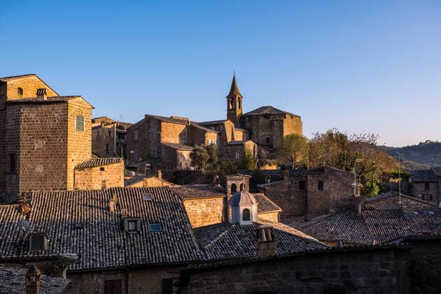 The church Chiesa di San Giovanni Evangelista, seen across the roofs of the medieval town Orvieto Umbria Italy Reise FB_2019_1822