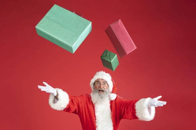man santa costume throwing gifts air . High quality and resolution beautiful photo concept man santa costume throwing gifts air . Resolution and high quality beautiful photo Copyright: xZoonar.com OleksandrxLatkunx 17844911 ,model released, Symbolfoto ,property released