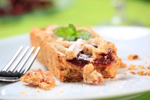 RECORD DATE NOT STATED Mini dessert pie with fruit filling , 21797436.jpg, closeup, plate, baked, British cuisine, food, one, treat, snack, confectionery, bar, cookie, cake, mincemeat, jelly, preserve, crostata, crust pastry, shortbread, lattice, small, mini, sweet, dessert, marmalade, jam, Christmas pie, filling, fruit, tart, mince pie,