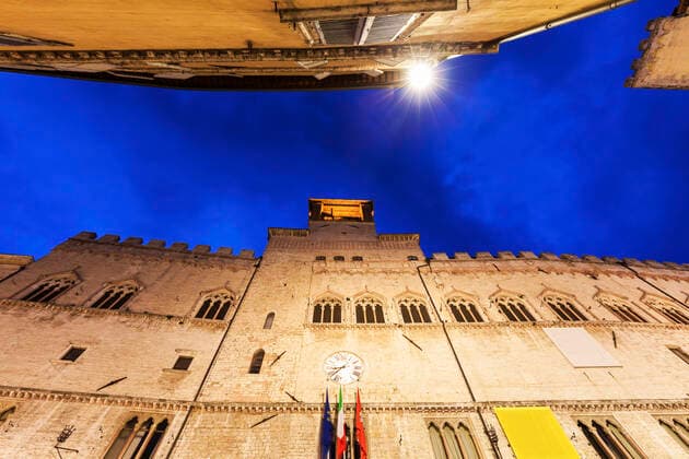 RECORD DATE NOT STATED Architecture of Perugia at night. Perugia, Umbria, Italy. , 22005160.jpg, tower, Europe, Italy, Perugia, Town, Umbria, architecture, city, evening, landmark, skyline, street, travel, looking up, blue, evening, sky, dramatic, cloudy, street, building,