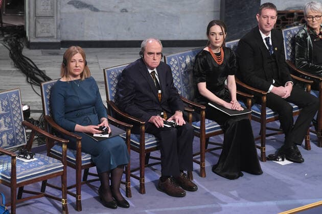 Belarusian Natallia Pinchuki (wife of 2022 Nobel Peace Prize winner - jailed Belarusian activist Ales Bialiatski), Russian Yan Rachinsky (chairman of the international Memorial Board), and Ukrainian Oleksandra Matviichuk (head of the Ukrainian Center for Civil Liberties) attend the 2022 Nobel Peace Prize award ceremony at the City Hall in Oslo, Norway on December 10, 2022.  LON20221210204 PAULxTREADWAY
