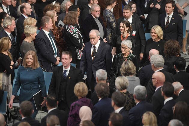 Belarusian Natallia Pinchuki (wife of 2022 Nobel Peace Prize winner - jailed Belarusian activist Ales Bialiatski), Russian Yan Rachinsky (chairman of the international Memorial Board), and Ukrainian Oleksandra Matviichuk (head of the Ukrainian Center for Civil Liberties) attend the 2022 Nobel Peace Prize award ceremony at the City Hall in Oslo, Norway on December 10, 2022.  LON20221210223 PAULxTREADWAY