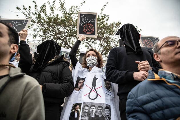 December 10, 2022, Istanbul, Turkey: Protester chants slogans during the demonstration. Mahsa Amini s death has sparked weeks of violent protests across Iran and other countries. Mahsa fell into a coma and died after being arrested in Tehran by the morality police for allegedly violating the country s hijab rules. In the trials regarding the protests, 11 people have been sentenced to death so far. Istanbul Turkey - ZUMAs197 20221210_zaa_s197_167 Copyright: xOnurxDogmanx