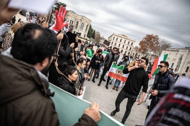 December 10, 2022, Istanbul, Turkey: Protesters hold placards expressing their opinion during the demonstration. Mahsa Amini s death has sparked weeks of violent protests across Iran and other countries. Mahsa fell into a coma and died after being arrested in Tehran by the morality police for allegedly violating the country s hijab rules. In the trials regarding the protests, 11 people have been sentenced to death so far. Istanbul Turkey - ZUMAs197 20221210_zaa_s197_175 Copyright: xOnurxDogmanx