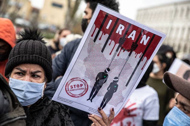 December 10, 2022, Istanbul, Turkey: A woman seen holding a placard during the demonstration. Mahsa Amini s death has sparked weeks of violent protests across Iran and other countries. Mahsa fell into a coma and died after being arrested in Tehran by the morality police for allegedly violating the country s hijab rules. In the trials regarding the protests, 11 people have been sentenced to death so far. Istanbul Turkey - ZUMAs197 20221210_zaa_s197_181 Copyright: xOnurxDogmanx