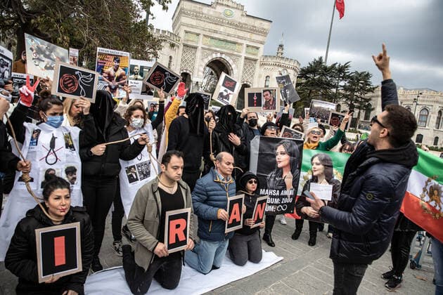 December 10, 2022, Istanbul, Turkey: Protesters performed an execution scene with ropes around their necks during the demonstration. Mahsa Amini s death has sparked weeks of violent protests across Iran and other countries. Mahsa fell into a coma and died after being arrested in Tehran by the morality police for allegedly violating the country s hijab rules. In the trials regarding the protests, 11 people have been sentenced to death so far. Istanbul Turkey - ZUMAs197 20221210_zaa_s197_182 Copyright: xOnurxDogmanx