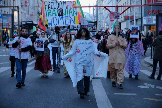 December 11, 2022, Paris, Ile de France, FRANCE: Hundreds of people marched in Paris to denounce the Islamic regime in Iran. Mohsen Shekari was the first Iranian to be excecuted on Thursday, december 8th 2022 by the increasingly repressive Iranian regime for participating in protests with more facing the death penalty on similar charges. Paris FRANCE - ZUMAh172 20221211_zip_h172_008 Copyright: xRemonxHaazenx