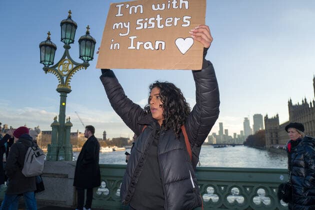 December 11, 2022: Hundreds of Iranian activists was marching today from the London Eye to Trafalgar Square in London.The march being held to coincide with international human rights day. The demo in London was organised by women-led grassroots group Be Irans Voice and Iran rights group Voice of Iran. - ZUMAg173 20221211_zap_g173_014 Copyright: xVelarxGrantx