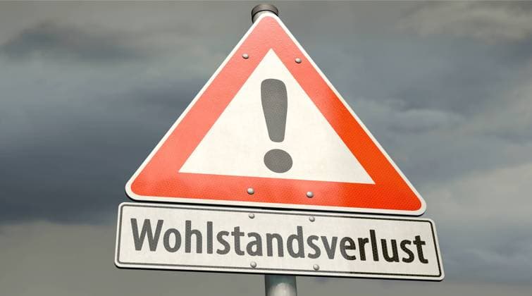 Schild Wohlstandsverlust Symbolbild zum Thema Angst vor Wohlstandsverlust *** Sign prosperity loss symbol image about fear of prosperity loss