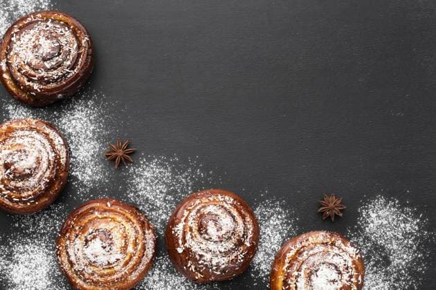 top view delicious cinnamon rolls with copy space. High quality and resolution beautiful photo concept top view delicious cinnamon rolls with copy space. Resolution and high quality beautiful photo Copyright: xZoonar.com OleksandrxLatkunx 17859517
