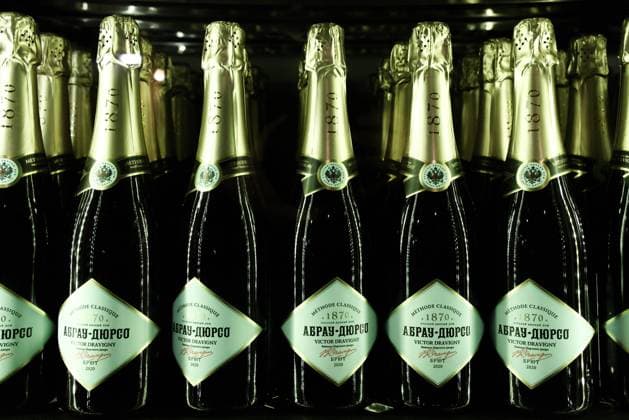 RUSSIA, NOVOROSSIYSK - DECEMBER 13, 2022: Bottles of sparkling wine on display in a factory shop at the Abrau-Durso winery in the village of Abrau-Durso, a suburb of Novorossiysk. Abrau-Durso Group produces sparkling wines, still wines, strong alcoholic beverages, cider, soft carbonated drinks and artesian water. Dmitry Feoktistov TASS  56398749