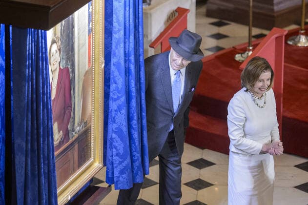 Speaker of the House Nancy Pelosi, D-CA, admires her portrait as her husband, Paul Pelosi, looks on during a ceremony in Statuary Hall at the U.S. Capitol in Washington, DC on Wednesday, December 14, 2022. Pelosi is the first female speaker of the house.  WAP20221214342 BONNIExCASH