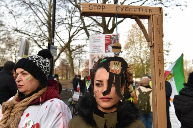 December 17, 2022, London, England, United Kingdom: Protesters take part in a demonstration in central London, calling to stop executions of protesters in Iran, and in solidarity with the freedom uprising in Iran, over the death of Mahsa Amini in custody, by Iranian morality police. Mahsa Amini was killed on 16 September, after her arrest for allegedly breaching Iran s laws for women on wearing hijab, headscarves and modest clothing. London United Kingdom - ZUMAk172 20221217_zip_k172_001 Copyright: xThomasxKrychx