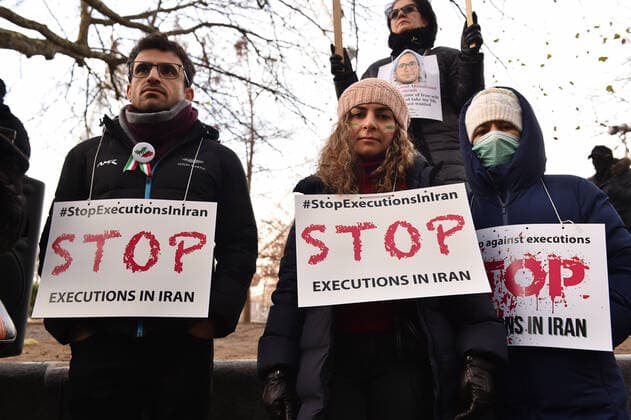 December 17, 2022, London, England, United Kingdom: Protesters take part in a demonstration in central London, calling to stop executions of protesters in Iran, and in solidarity with the freedom uprising in Iran, over the death of Mahsa Amini in custody, by Iranian morality police. Mahsa Amini was killed on 16 September, after her arrest for allegedly breaching Iran s laws for women on wearing hijab, headscarves and modest clothing. London United Kingdom - ZUMAk172 20221217_zip_k172_004 Copyright: xThomasxKrychx