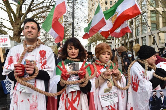December 17, 2022, London, England, United Kingdom: Protesters take part in a demonstration in central London, calling to stop executions of protesters in Iran, and in solidarity with the freedom uprising in Iran, over the death of Mahsa Amini in custody, by Iranian morality police. Mahsa Amini was killed on 16 September, after her arrest for allegedly breaching Iran s laws for women on wearing hijab, headscarves and modest clothing. London United Kingdom - ZUMAk172 20221217_zip_k172_006 Copyright: xThomasxKrychx