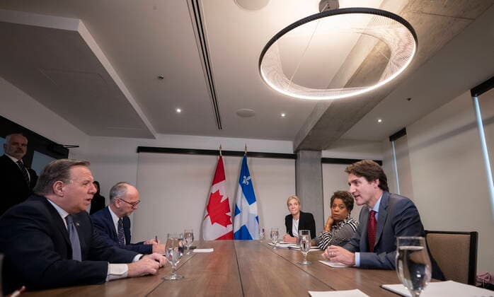 December 20, 2022, Montreal, PQ, Canada: Prime Minister Justin Trudeau and Quebec Premier Francois Legault chat prior to a meeting in Montreal, on Tuesday, December 20, 2022. Montreal Canada  - ZUMAc35_ 20221220_zaf_c35_012 Copyright: xPaulxChiassonx