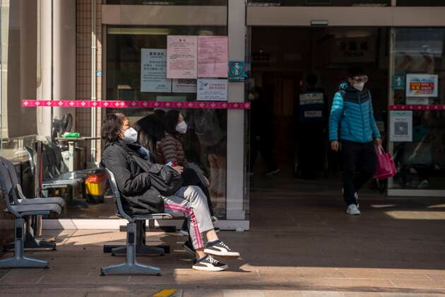 Macau Covid-19 Measures People sitting at the entrance for the emergency room at Kiang Wu Hospital on December 29, 2022 in Macau, China. Macau Macau  Copyright: xVernonxYuenx originalFilename: yuen-macaucov221229_nphAB.jpg
