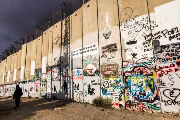 Street Art And Banksy Hotel In Bethlehem Street art graffiti and murals on the Israeli separation West Bank Wall in Bethlehem, Palestine on December 28, 2022. Bethlehem Palestine  Copyright: xBeataxZawrzelx originalFilename: zawrzel-streetar221228_nphtC.jpg