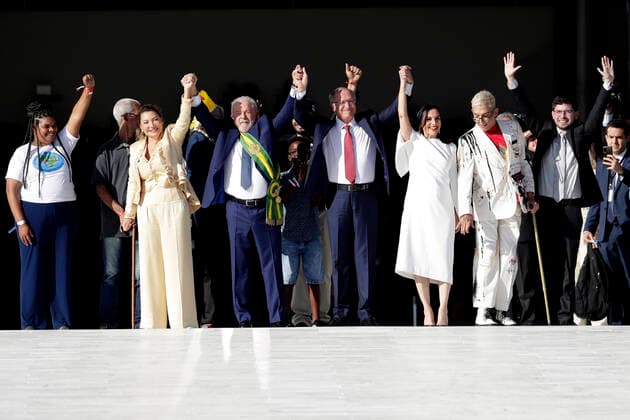 (230102) -- BRASILIA, Jan. 2, 2023 -- Luiz Inacio Lula da Silva (front, 3rd L) greets his supporters at Planalto Palace in Brasilia, Brazil, Jan. 1, 2023. Luiz Inacio Lula da Silva of the Workers Party (PT) was sworn in as president of Brazil for a four-year term on Sunday. (Photo by Xinhua) BRAZIL-BRASILIA-PRESIDENT-INAUGURATION LucioxTavora 