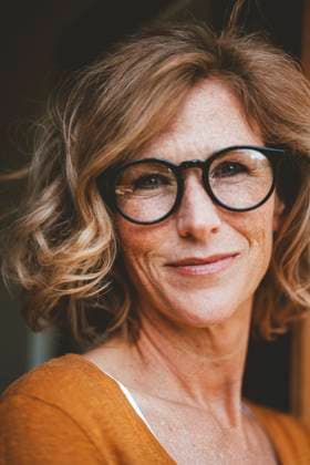 Creative Highlights Symbolbilder Smiling mature woman wearing eyeglasses model released, Symbolfoto property released, JOSEF15616