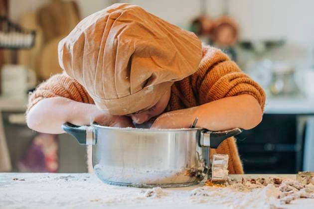 Boy wearing chefs hat making cookies at home model released, Symbolfoto property released, VSNF00129