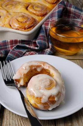 bun of pumpkin with cinnamon Broken bun of pumpkin with cinnamon in the form of snails closeup Copyright: xZoonar.com MarynaxVoronovax 9826106
