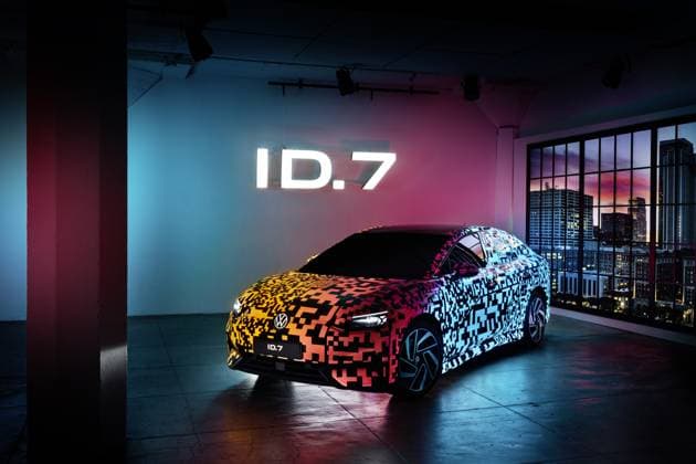 Volkswagen are to unveil their new ID 7 electric car at the Consumer Electronics Show in Las Vegas from 5 January 2022. The ID 7, which had previously been known as Aero B as a concept car, is the sixth model to be launched in the ID range and will initially sit alongside the Volkswagen Arteon and Volkswagen Passat, as a five door liftback and estate - and compete with the likes of the Tesla Model 3, Polestar 2 and Hyundai Ioniq 6. It will initially be two-wheel drive with a four-wheel-drive GTX model launching later - boasting a a powertrain line-up that mirrors that of its main rivals. Although VW are keeping its technical details close to its chest, it will have a range of up to 435 miles with a larger-battery model. However, initially, Copyright: xingoxbarenscheex 52317386 EDITORIAL USE ONLY. NOT FOR USE BY NEWSPAPERS BASED IN THE UK.