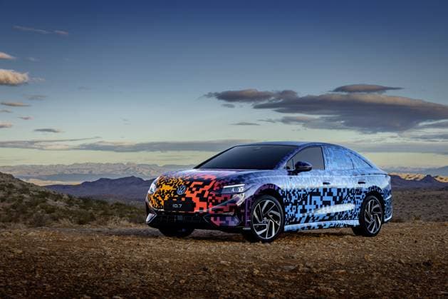 Volkswagen are to unveil their new ID 7 electric car at the Consumer Electronics Show in Las Vegas from 5 January 2022. The ID 7, which had previously been known as Aero B as a concept car, is the sixth model to be launched in the ID range and will initially sit alongside the Volkswagen Arteon and Volkswagen Passat, as a five door liftback and estate - and compete with the likes of the Tesla Model 3, Polestar 2 and Hyundai Ioniq 6. It will initially be two-wheel drive with a four-wheel-drive GTX model launching later - boasting a a powertrain line-up that mirrors that of its main rivals. Although VW are keeping its technical details close to its chest, it will have a range of up to 435 miles with a larger-battery model. However, initially, Copyright: xx 52317388 EDITORIAL USE ONLY. NOT FOR USE BY NEWSPAPERS BASED IN THE UK.
