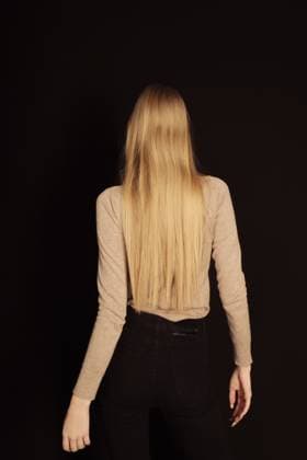 Creative Highlights Symbolbilder blonde woman with long healthy hair on a black background. Gomel, Gomel Region, Belarus R_PJWUOI230103D5-1095013-01 ,model released, Symbolfoto