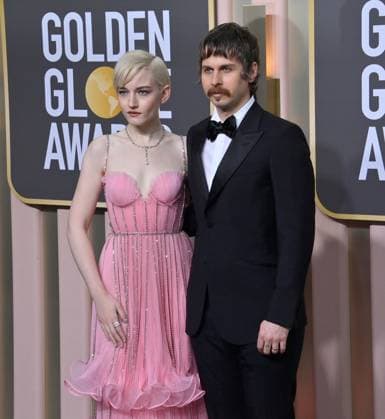 (L-R) Julia Garner and Mark Foster arrive for the 80th annual Golden Globe Awards at the Beverly Hilton in Beverly Hills, California on Tuesday, January 10, 2023.  LAP20230110255 JIMxRUYMEN