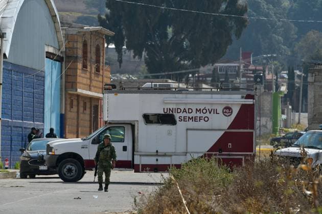 More than 20 bags with human remains found in clandestine grave in the State of Mexico January 13 in Tenango del Valle, Mexico : Forensic experts of the State of Mexico carry out the diligences where were found in a clandestine grave inside an industrial warehouse at least 26 packages with human remains; Military in company of the police of the State of Mexico guard the perimeter. on January 13 in Tenango del Valle, MÃ xico. (Photo by Arturo Hernandez Eyepix Group) Copyright: xArturoxHernandezx xEyepixxGroupx AH_130123_01