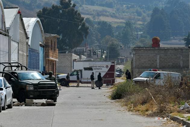 More than 20 bags with human remains found in clandestine grave in the State of Mexico January 13 in Tenango del Valle, Mexico : Forensic experts of the State of Mexico carry out the diligences where were found in a clandestine grave inside an industrial warehouse at least 26 packages with human remains; Military in company of the police of the State of Mexico guard the perimeter. on January 13 in Tenango del Valle, MÃ xico. (Photo by Arturo Hernandez Eyepix Group) Copyright: xArturoxHernandezx xEyepixxGroupx AH_130123_03