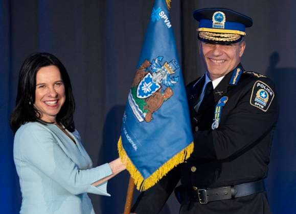 January 19, 2023, Montreal, PQ, Canada: New Montreal police chief Fady Dagher takes the departmental flag from Mayor Valerie Plante after being sworn in during a ceremony, Thursday, January 19, 2023 in Montreal. Montreal Canada  - ZUMAc35_ 20230119_zaf_c35_026 Copyright: xRyanxRemiorzx