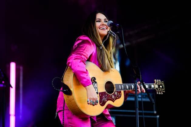 TAMWORTH COUNTRY MUSIC FESTIVAL 2023, Sinead Burgess performs at Adam Brand?s Friday Night Bash concert during the 51st Tamworth Country Music Festival in Tamworth, NSW, Friday, January 20, 2023. The 51st Tamworth Country Music Festival runs from January 13th -22nd, culminating in the Golden Guitar Awards night which celebrates the best of Australian country music. ( NO ARCHIVING, EDITORIAL USE ONLY, NO USE IN BOOKS WITHOUT CONSENT TAMWORTH NEW SOUTH WALES AUSTRALIA  Copyright: xBIANCAxDExMARCHIx 20230120001754685663