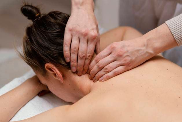 close up therapist massaging neck close up therapist massaging neck Copyright: xZoonar.com OleksandrxLatkunx 18428188 ,model released, Symbolfoto ,property released