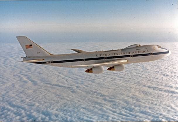 March 26, 1985, Offutt Air Force Base, Nebraska, USA: An E4B (NEACP) National Emergency Airborne Command Post, based at 595th Command and Control Group at Offutt Air Force Base, Nebraska, in flight over clouds on March 26, 1985. The E-4B is a militarized version of the Boeing 747-200, a four-engine, swept-wing, long-range high-altitude airplane capable of refueling in flight. In case of national emergency or destruction of ground command and control centers, the aircraft provides a highly survivable command, control and communications center to direct United States forces, execute emergency war orders and coordinate actions by civil authorities. .Mandatory Credit: Michael J. Haggerty US Air Force via CNP Offutt Air Force Base USA  - ZUMAc306 19850326_zaa_c306_001 Copyright: xMichaelxJ.xHaggertyx-xUsxAirxForx