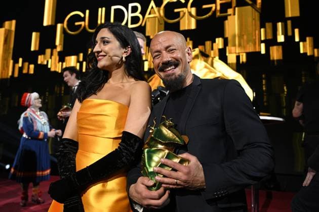 STOCKHOLM 20230123 Director Tarik Saleh poses with his golden beetle for best screenplay for the film Boy from heaven together with Golden Beetle Gala host Parisa Amiri after the Golden Beetle Gala at Cirkus in Stockholm STOCKHOLMK SWEDEN x10040x,  Copyright: xAndersxWiklund TTx GULDBAGGEN 2023 TTABB0000000000154726
