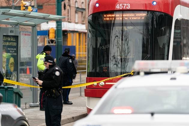 January 24, 2023, Toronto, ON, CANADA: Police cars surround a TTC streetcar on Spadina Ave., in Toronto on Tuesday, January 24, 2023. Police say a person was stabbed multiple times on a Toronto streetcar. They say the victim was sent to hospital and a suspect was arrested at the scene. Toronto CANADA  - ZUMAc35_ 20230124_zaf_c35_039 Copyright: xArlynxMcadoreyx