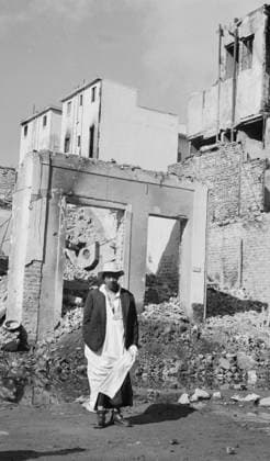 Port Said, Egypt. December 19, 1956. A city resident stands in Abadi Street destroyed by the British and French forces during the Suez Crisis. Pyotr Yegorov TASS  13774588