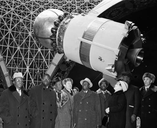Moscow, USSR. December 15, 1965. A Mali delegation headed by Minister of Trade and Finance Attaye Maiga visits a Vostok spacecraft in the Engineering Pavilion at the Exhibition of Achievements of National Economy (VDNKh). Nikolai Sitnikov TASS  18681684