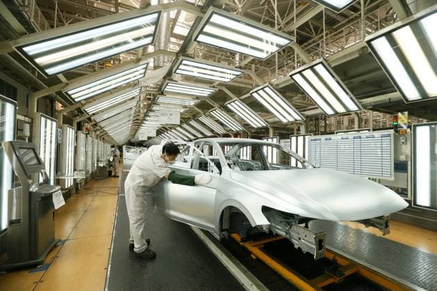 QINGDAO, CHINA - JANUARY 28: Car bodies are assembled at the Qingdao branch of FAW-Volkswagen Automobile Co., Ltd, a joint venture between FAW Group and Volkswagen Group, on January 28, 2023 in Qingdao, Shandong Province of China.  Copyright: xVCGx VCG111419913769